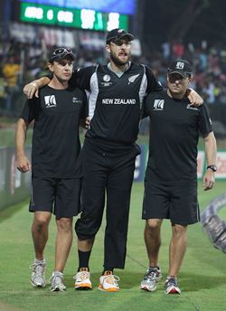 Daniel Vettori being carried off the field