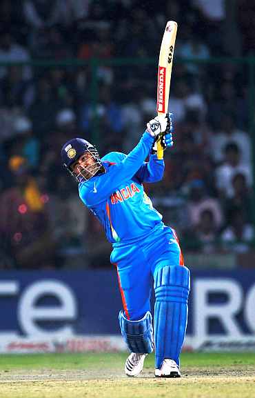 India's Virender Sehwag plays a shot during his knock against Netherlands