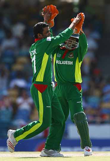 Abdur Razzak celebrates after the fall of a wicket