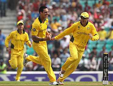 Mitchell Johnson celebrates after claiming a wicket