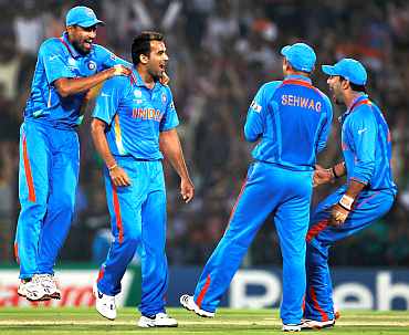 Zaheer Khan celebrates after claiming a wicket