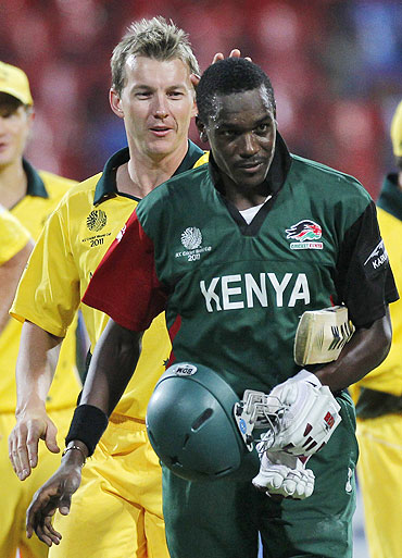 Australia's Brett Lee consoles Kenya's Collins Obuya (right) after Australia defeated Kenya on Sunday