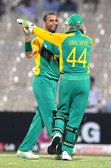 South Africa's Robin Peterson celebrates after picking the wicket of Kevin O'Brien during his match in Kolkata