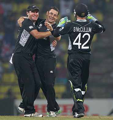 Nathan McCullum celebrates after picking up a wicket