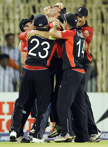 England's players celebrate after defeating the West Indies