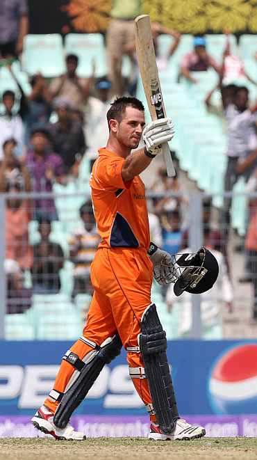 Ryan Ten Doeschate celebrates after completing his century against Ireland