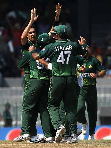 Umar Gul celebrates after picking an Australian wicket