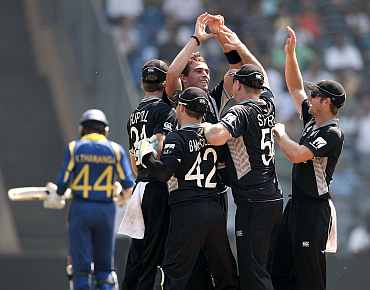Tim Southee celebrates after picking the wicket of Upul Tharanga