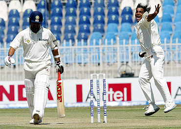 Shoaib Akhtar (right) celebrates after dismissing Sachin Tendulkar in the 2004 Rawalpindi Test