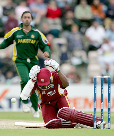Brian Lara goes down after being hit by a Shoaib Akhtar delivery during their ICC Champions Trophy match in 2004