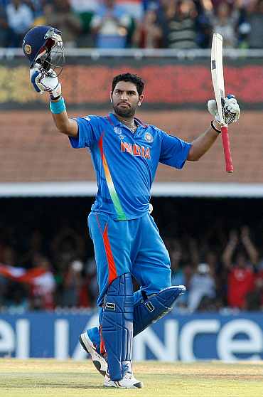 Yuvraj Singh ceclebrates after completing his century against West Indies