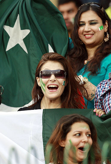 Pakistan fans cheer during the match between Australia and Pakistan