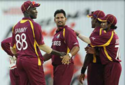 Ravi Rampaul celebrates after picking up a wicket