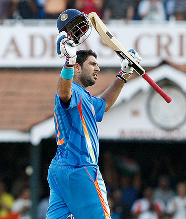 Yuvraj Singh acknowledges the crowd after his century