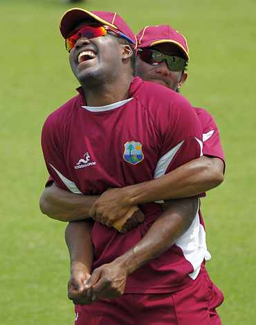West Indies' Darren Barvo and Bishoo during a training session