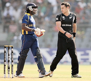 Mahela Jayawardena (left) has an altercation with Nathan McCullum after the catch was not given