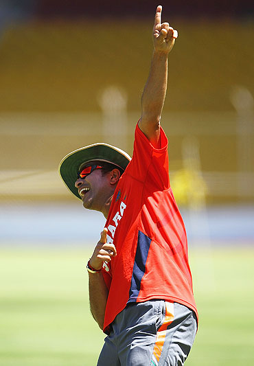 Sachin Tendulkar does an Usain Bolt impersonation during India's practice session in Ahmedabad on Tuesday