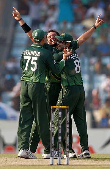 Shahid Afridi celebrates after picking a wicket