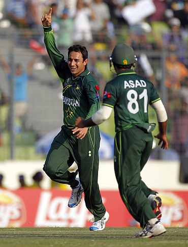 Saeed Ajmal celebrates after picking up a wicket against West Indies