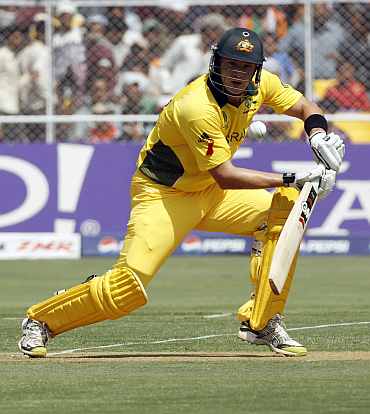 Shane Watson plays a shot during the quarter-final match against India