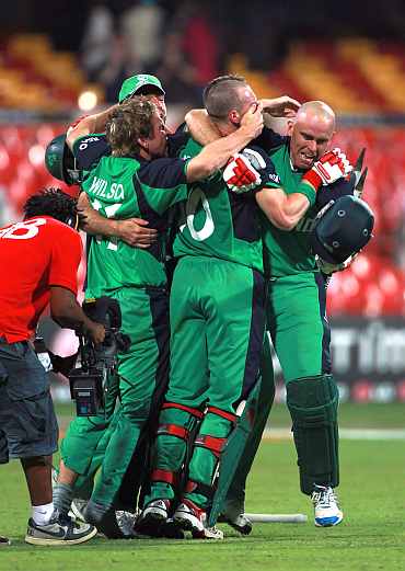Ireland players celebrate after winning their match against England