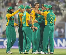 South African players celebrate the dismissal of a wicket