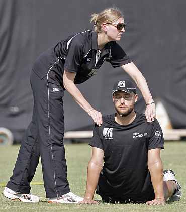 New Zealand's Daniel Vettori stretches during a cricket practice session