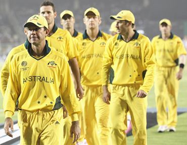 Ricky Ponting leads his team from the field after their loss to India in the World Cup quarter-final