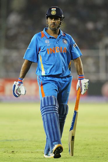 Dhoni walks off after being dismissed in the quarter-final