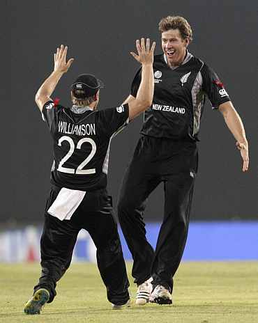 Jacob Oram celebrates after picking up a wicket in Mirpur