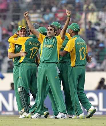 Imaran Tahir celebrates after picking up a New Zealand wicket