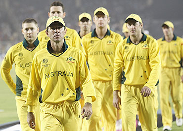 Ricky Ponting leads the Australian team out of the field after their loss to India