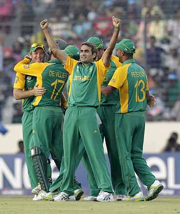Imran Tahir celebrates after picking up a wicket