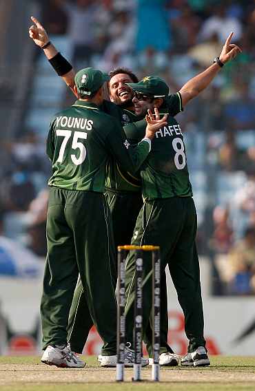 Shahid Afridi celebrates after picking up a wicket