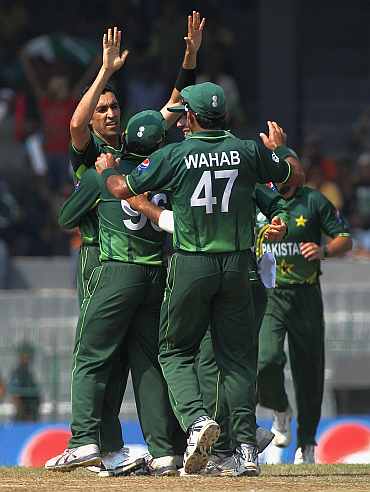 Umar Gul celebrates after picking up a wicket