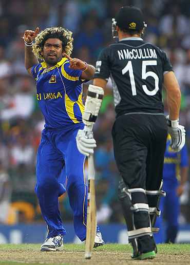 Lasith Malinga celebrats after picking up a wicket during his semi-final match against New Zealand