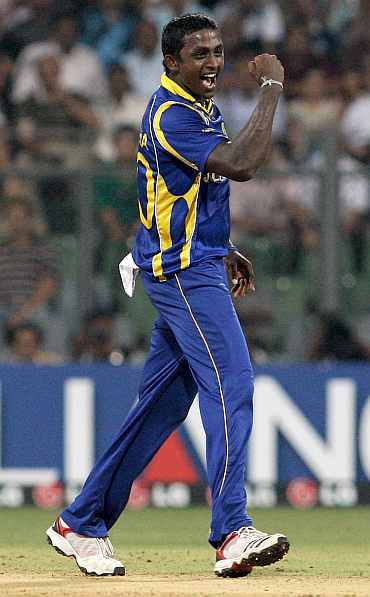 Ajantha Mendis celebrates after picking up a wicket
