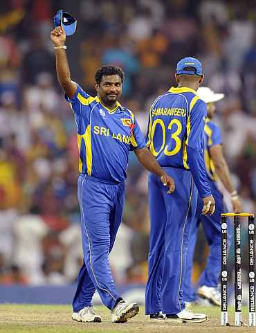 Muttaih Muralitharan celebrates after picking up the last New Zealand wicket
