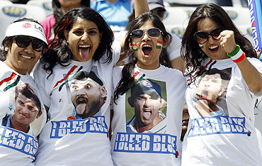 Fans of India pose before the start of the ICC Cricket World Cup 2011 semi-final match between India and Pakistan in Mohali on Wednesday