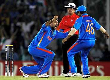 Yuvraj Singh celebrates after dismissing Younis Khan