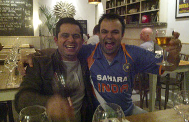 Reader Bankim Chandra and a friend celebrate India's win over a drink