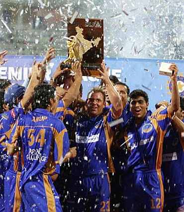 Shane Warne and his players with the 2008 IPL trophy