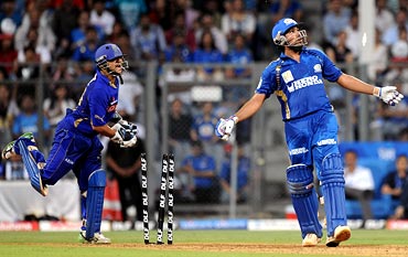 Rohit Sharma is stumped by wicketkeeper Pinal Shah off Shane Warne
