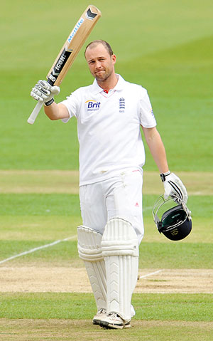 England's Jonathan Trott celebrates on reaching 150 