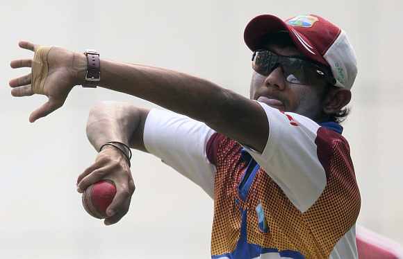 Devendra Bishoo in action during a practice session