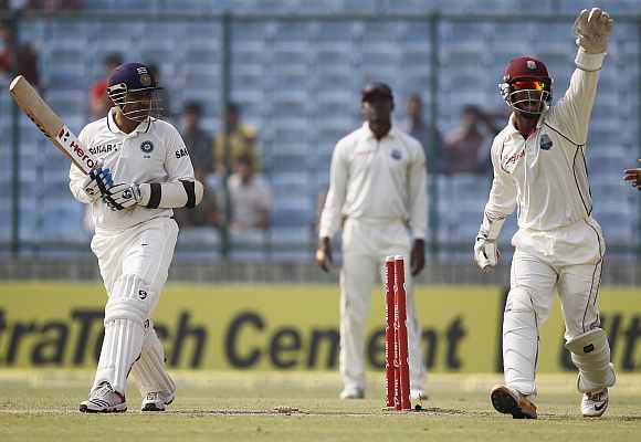 Carlton Baugh appeals for the Virender Sehwag's wicket