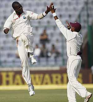 Sammy celebrates with Chanderpaul