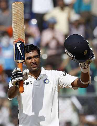 R Ashwin celebrates after completing his century