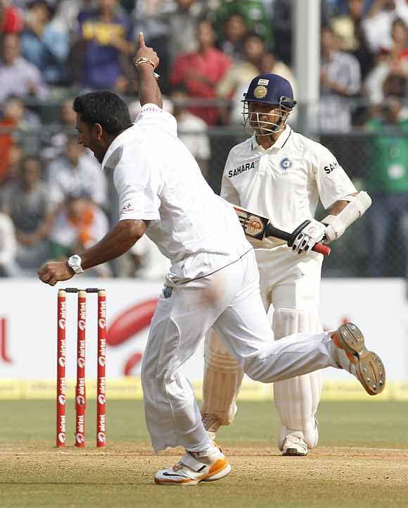 Ravi Rampaul celebrates after picking up Sachin Tendulkar's wicket