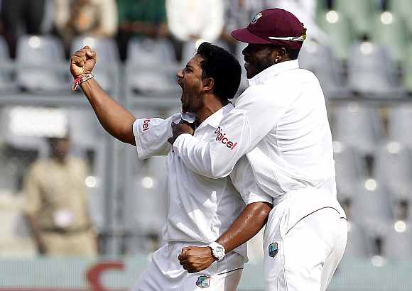 Ravi Rampaul celebrates after picking Sachin Tendulkar's wicket